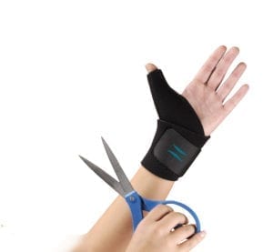 A Person wearing the Hely & Weber Trimmable Thumb support on their hand